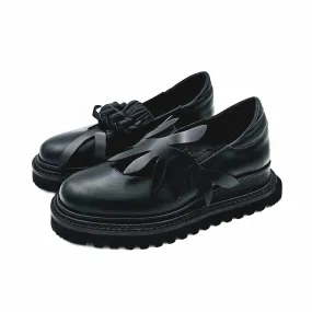 The Kindness black leather chunky loafers